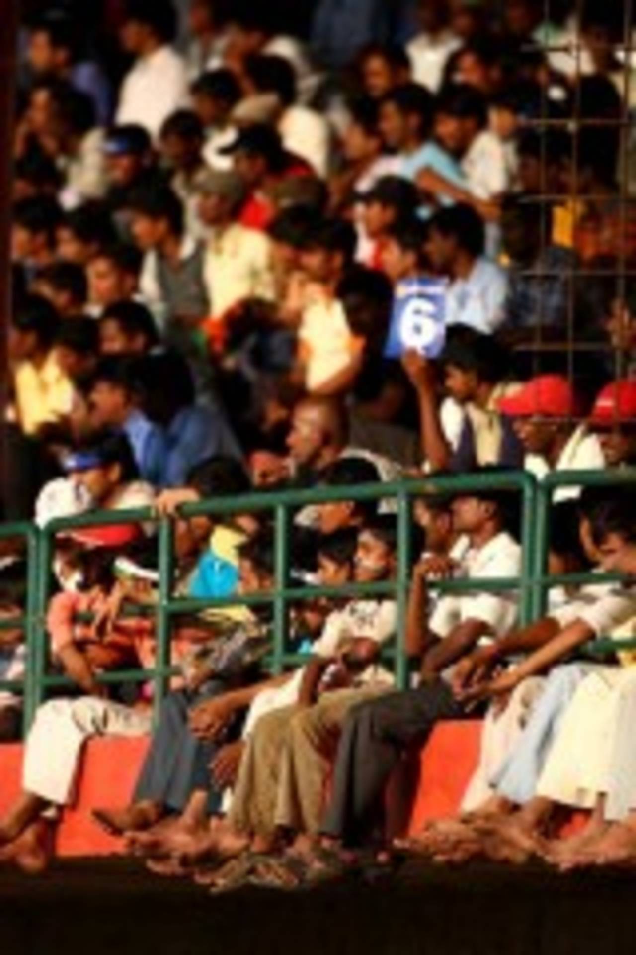 A few kids get hold of a vantage point to watch the game, India v Australia, 1st Test, 3rd day, Bangalore, October 11, 2008