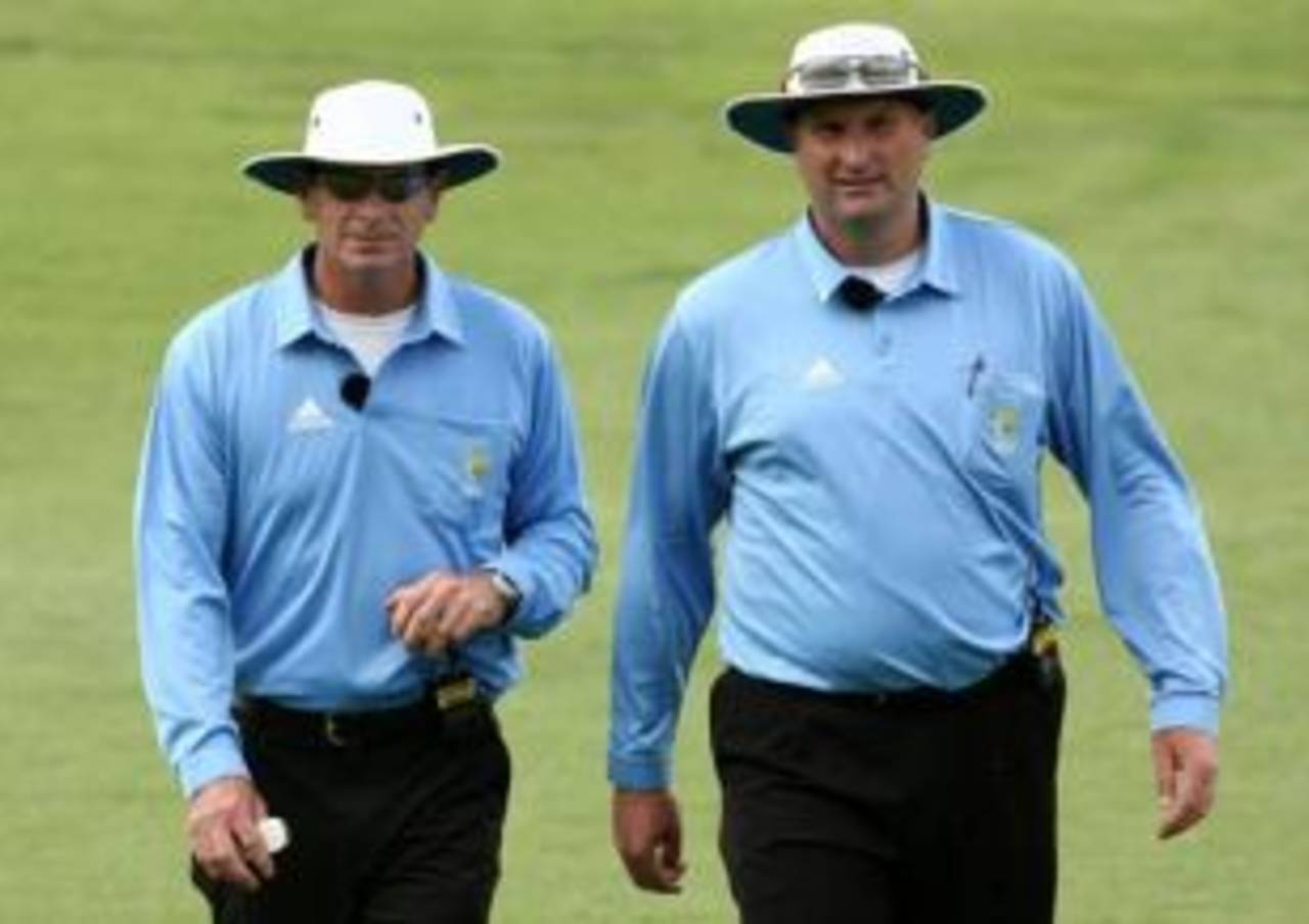The umpires Paul Reiffel and Paul Wilson leave the field, Western Australia v Tasmania, Ford Ranger Cup, Perth, October 24, 2008