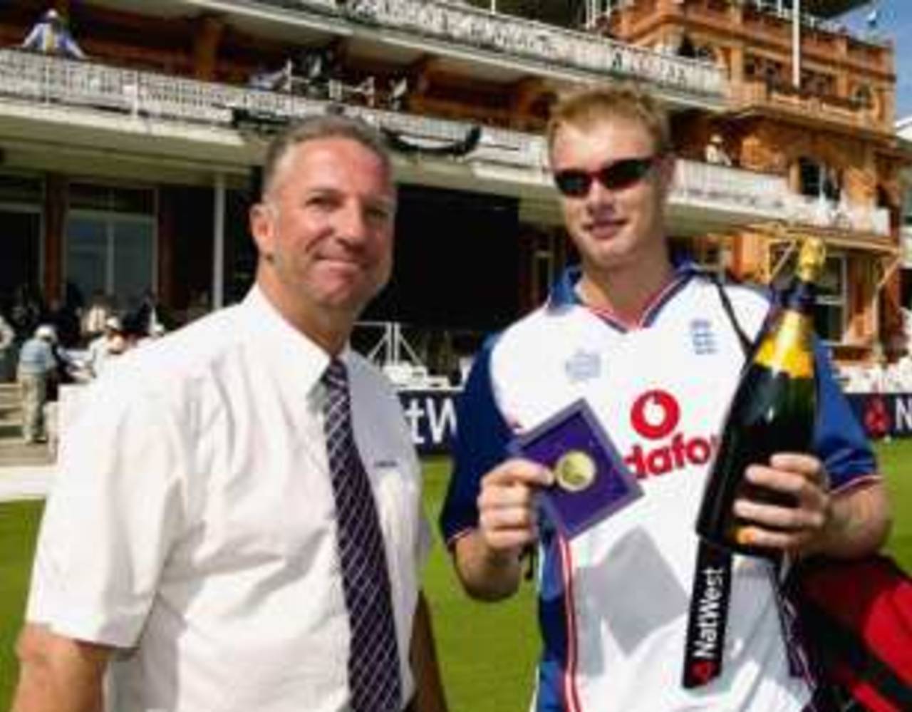 Ian Botham presents Andrew Flintoff with his Man-of-the-Match award, England v  South Africa, NatWest Series final, Lords. 12 July 2003
NULL