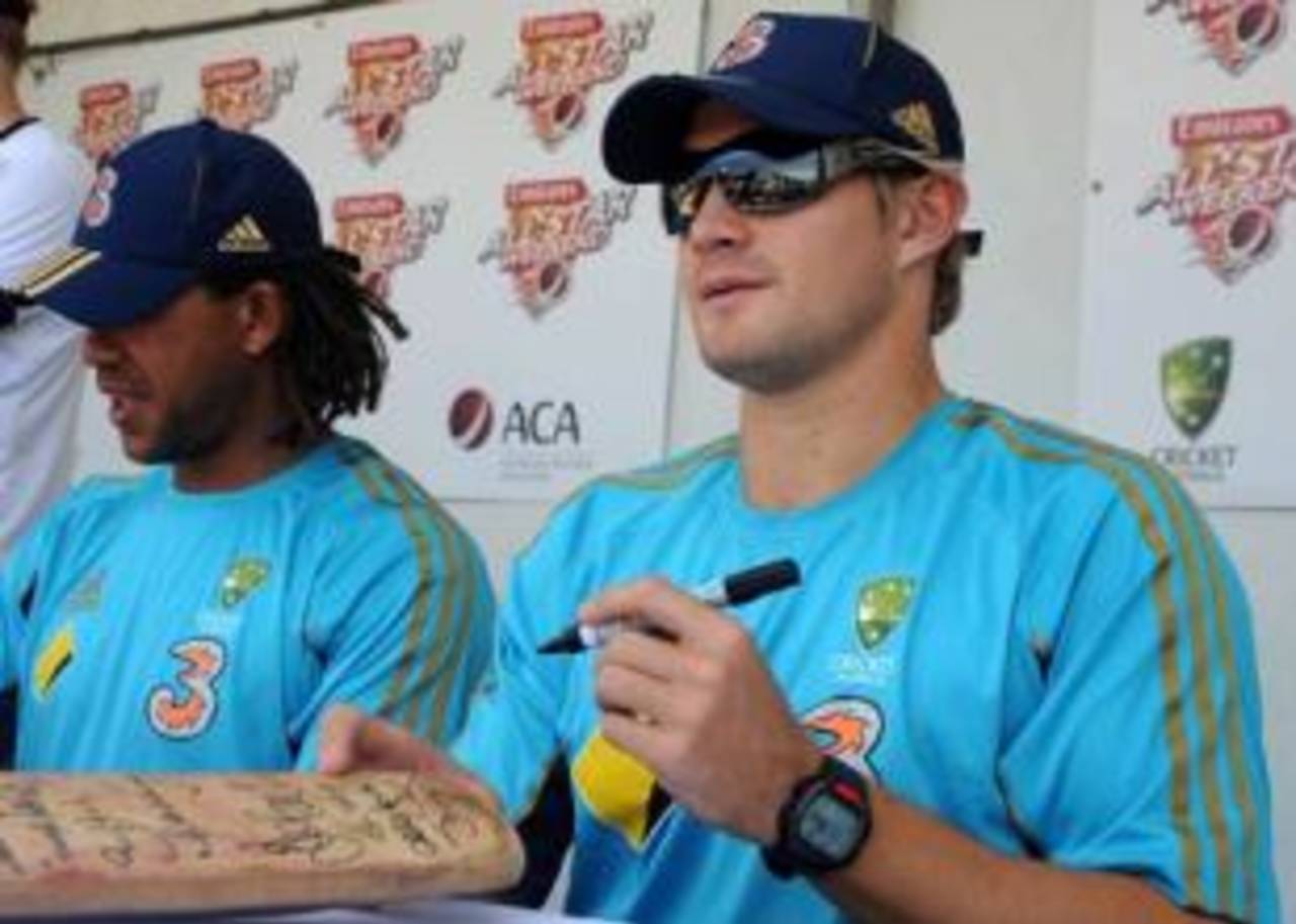 Andrew Symonds and Shane Watson sign autographs at the All-Star Fan Day, Brisbane, November 16, 2008
