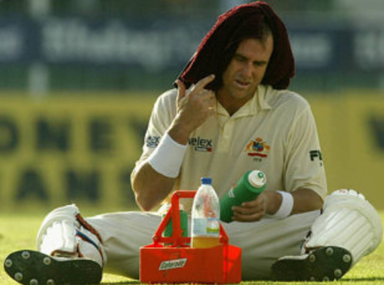 Matthew Hayden gets a much needed drink, Australia v Pakistan, 2nd Test, Sharjah, 1st day, October 11, 2002