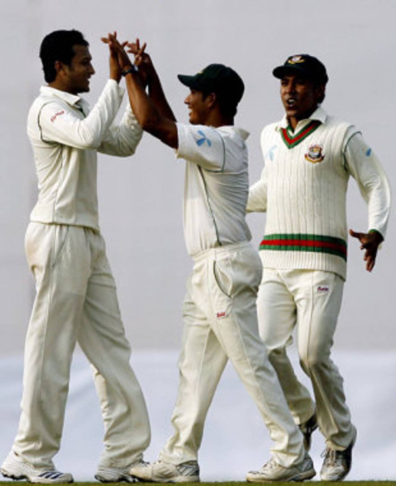 Shakib Al Hasan is congratulated by Mohammad Ashraful after getting rid of Kumar Sangkkara, Bangladesh v Sri Lanka, 1st Test, Mirpur, 1st day, December 26, 2008