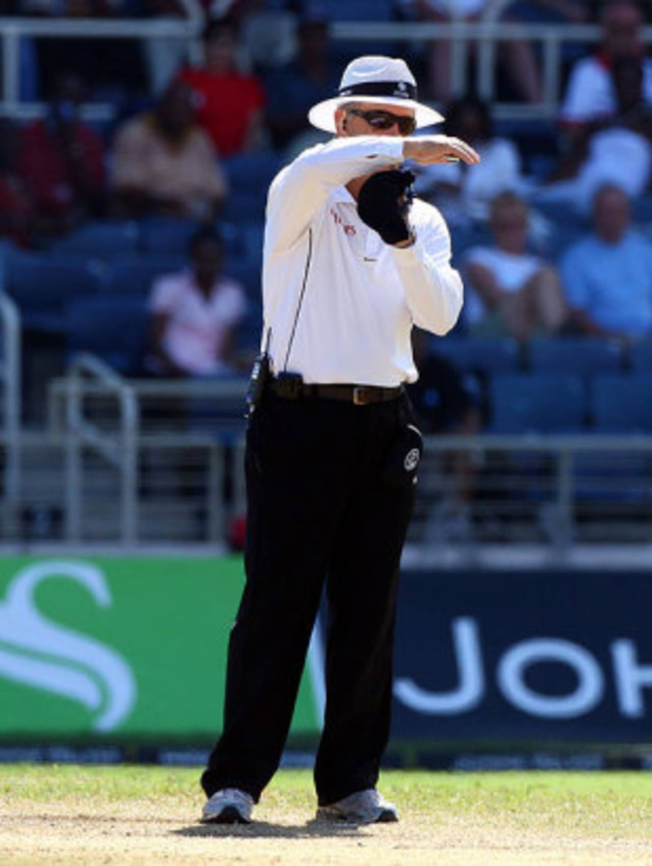 Umpire Tony Hill signals for a review of Shivnarine Chanderpaul's lbw decision, West Indies v England, 1st Test, Kingston, February 6, 2009
