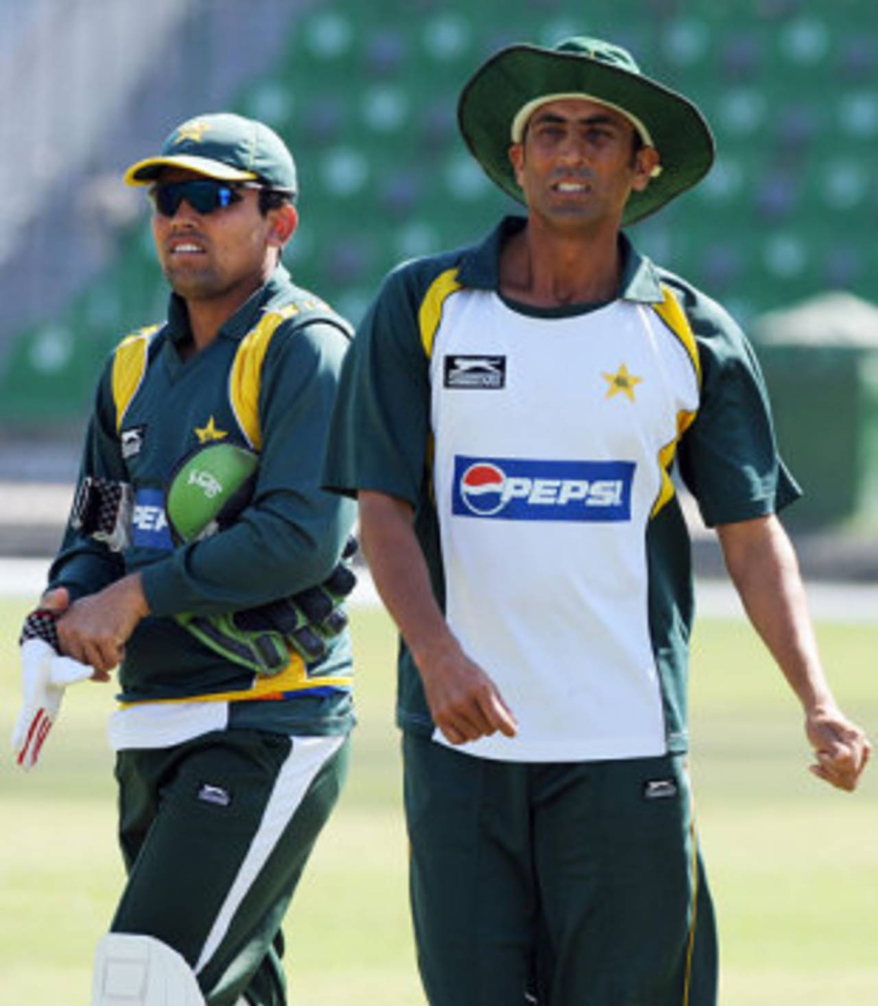 Kamran Akmal and Younis Khan look on during a practice session, Lahore, February 28, 2009