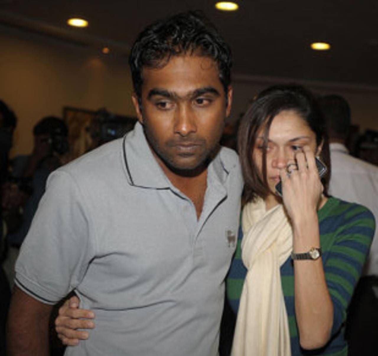 Mahela Jayawardene and his wife Christina leave Colombo airport after his arrival from Lahore&nbsp;&nbsp;&bull;&nbsp;&nbsp;AFP