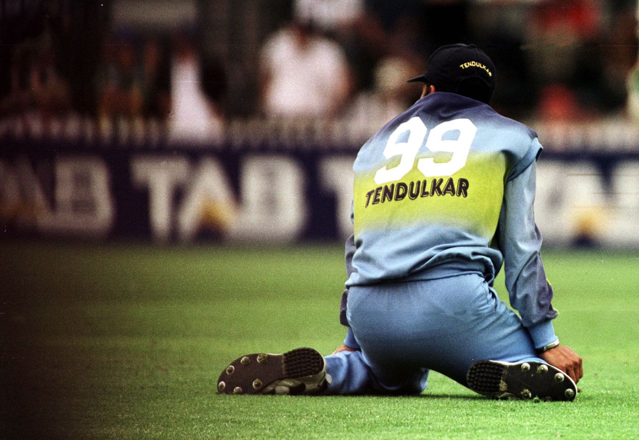 A dejected Sachin Tendulkar sits on the ground on his knees, Australia v India, Carlton & United Series, Adelaide, January 26, 2000