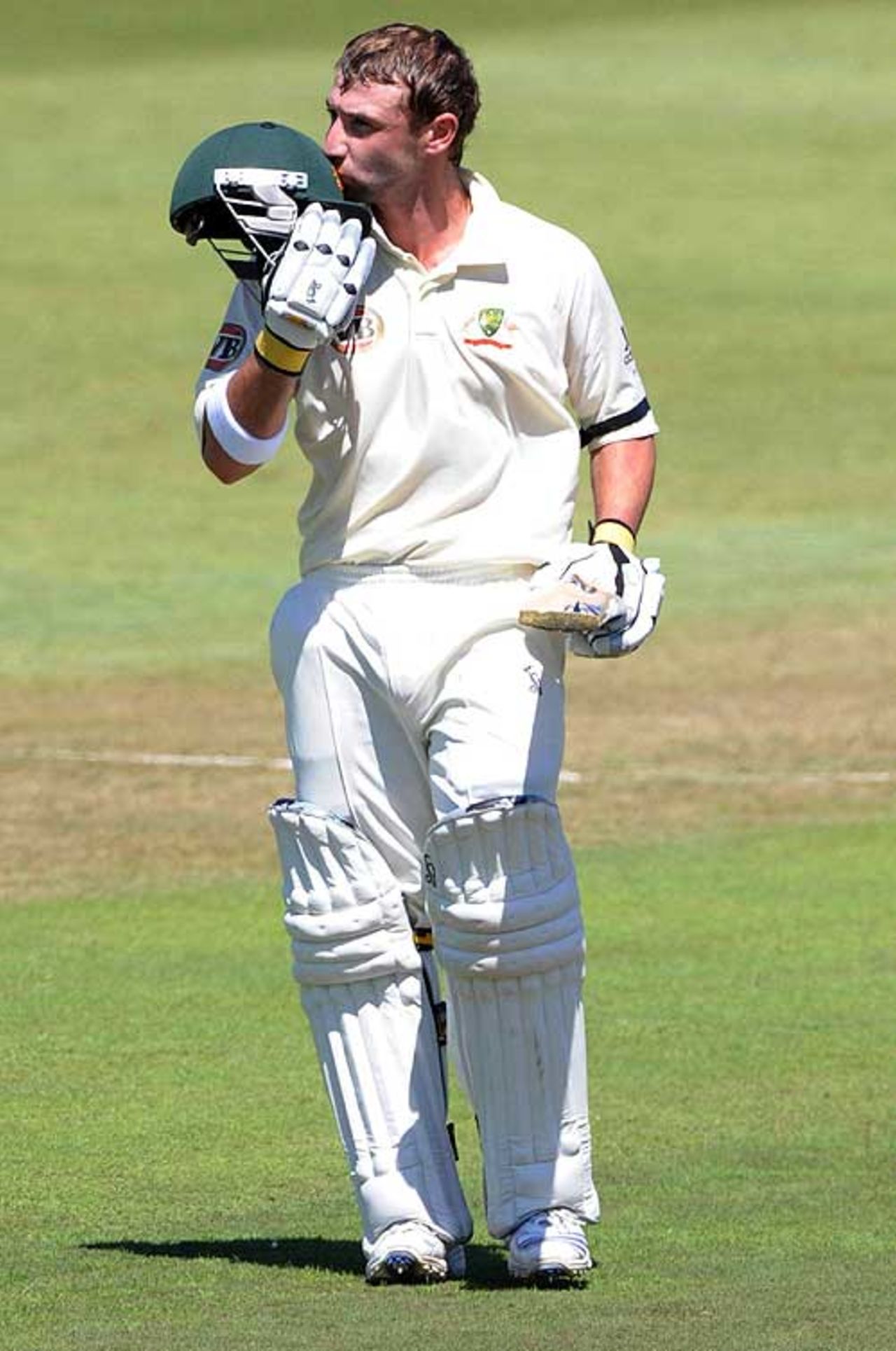Phillip Hughes kisses his helmet after a spectacular century, South Africa v Australia, 2nd Test, Durban, 1st day, March 6, 2009
