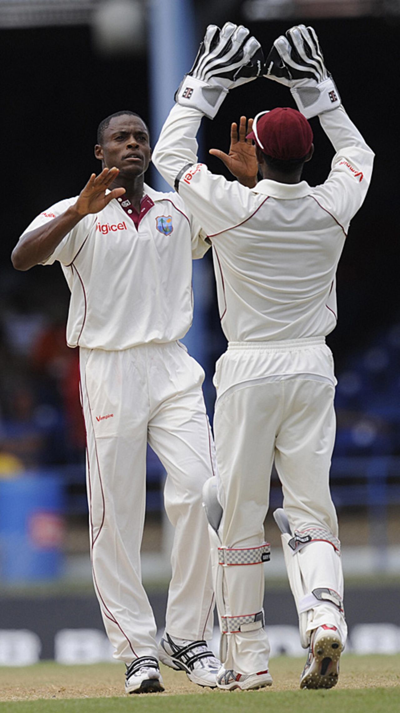 Denesh Ramdin congratulates Daren Powell on the wicket of Alastair Cook, West Indies v England, 5th Test, Trinidad, March 6, 2009