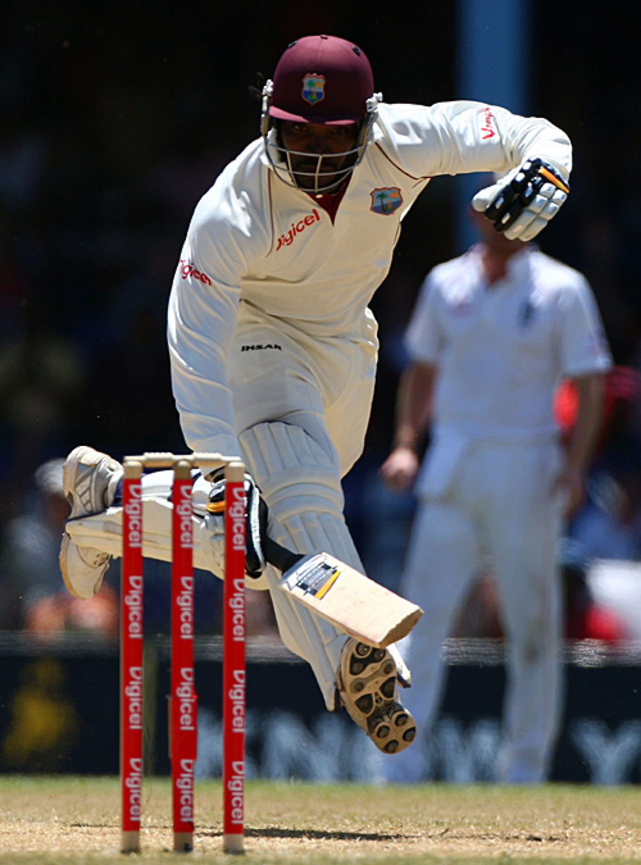 Chris Gayle sprints the single to bring up his hundred but, in the last stretch, tears his right hamstring to prompt his retirement, West Indies v England, 5th Test, Trinidad, March 8, 2009