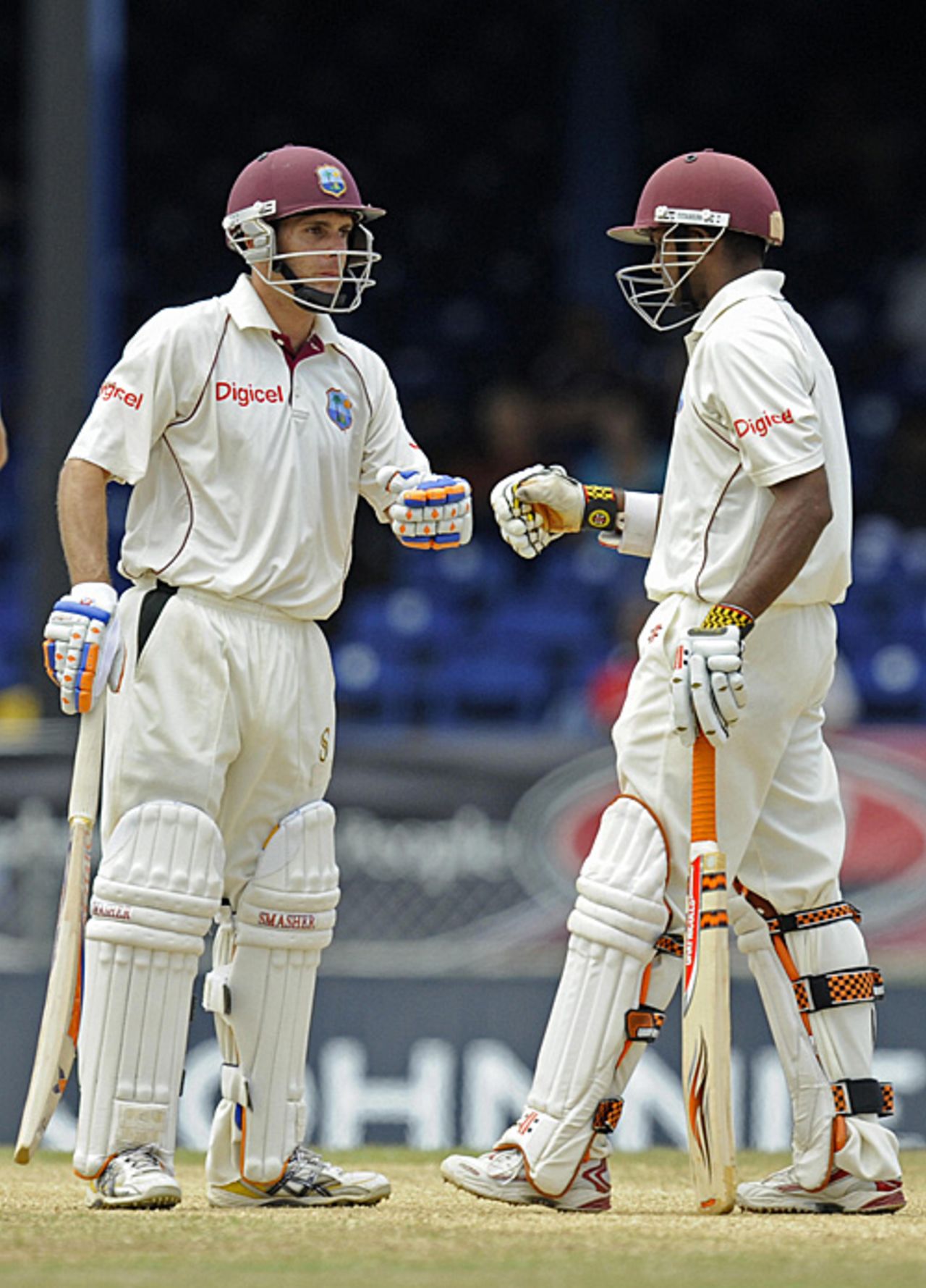 Brendan Nash and Shivnarine Chanderpaul punch gloves after reaching their 200 partnership, West Indies v England, 5th Test, Trinidad, March 9, 2009