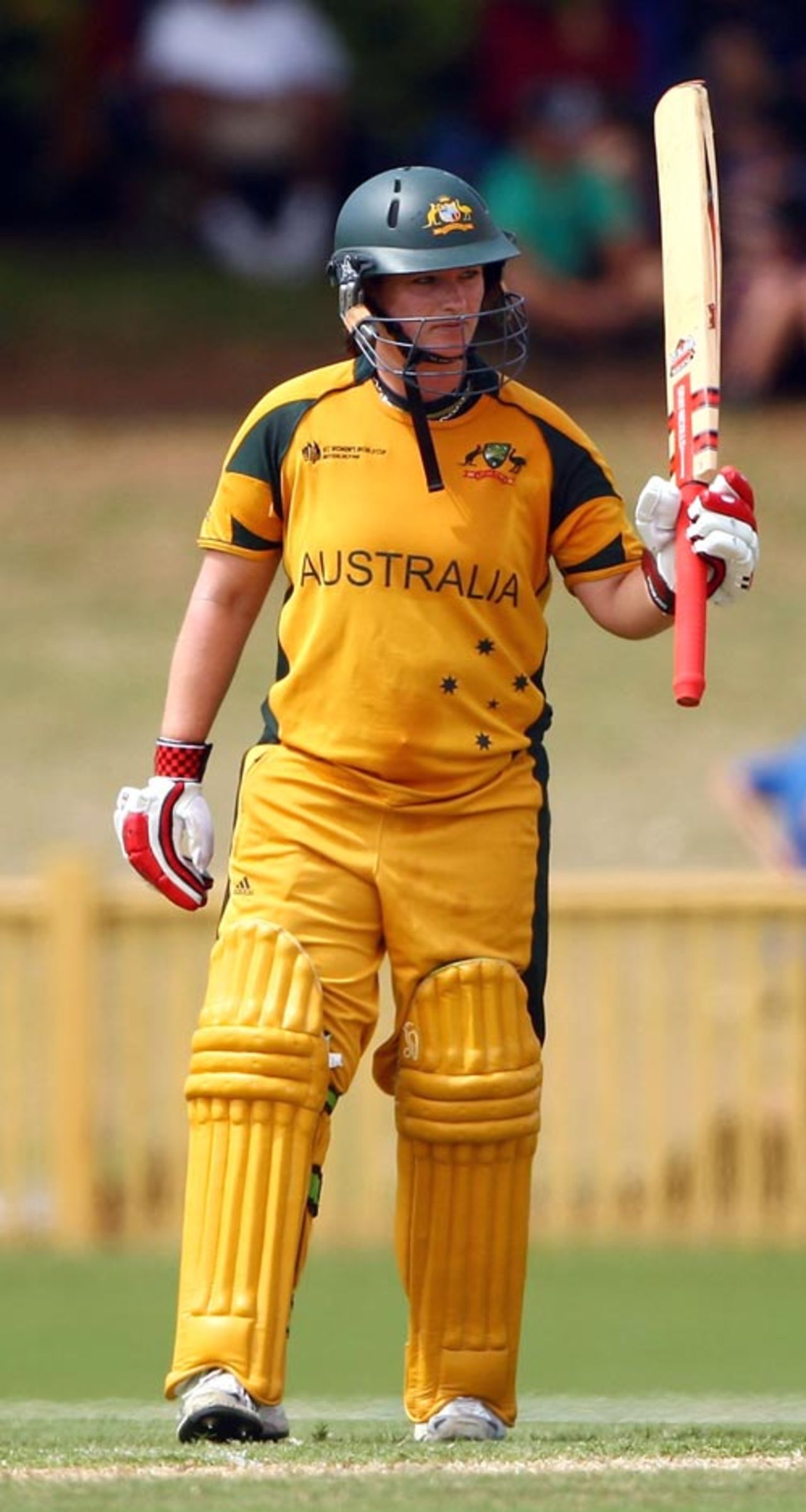 Karen Rolton raises her bat on reaching her half-century, Australia v South Africa, Group A, women's World Cup, Newcastle, March 10, 2009
