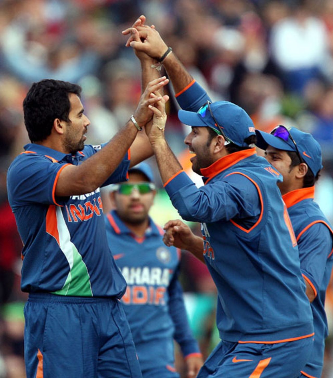 Zaheer Khan and Yuvraj Singh exult after Brendon McCullum's dismissal, New Zealand v India, 4th ODI, Hamilton, March 11, 2009