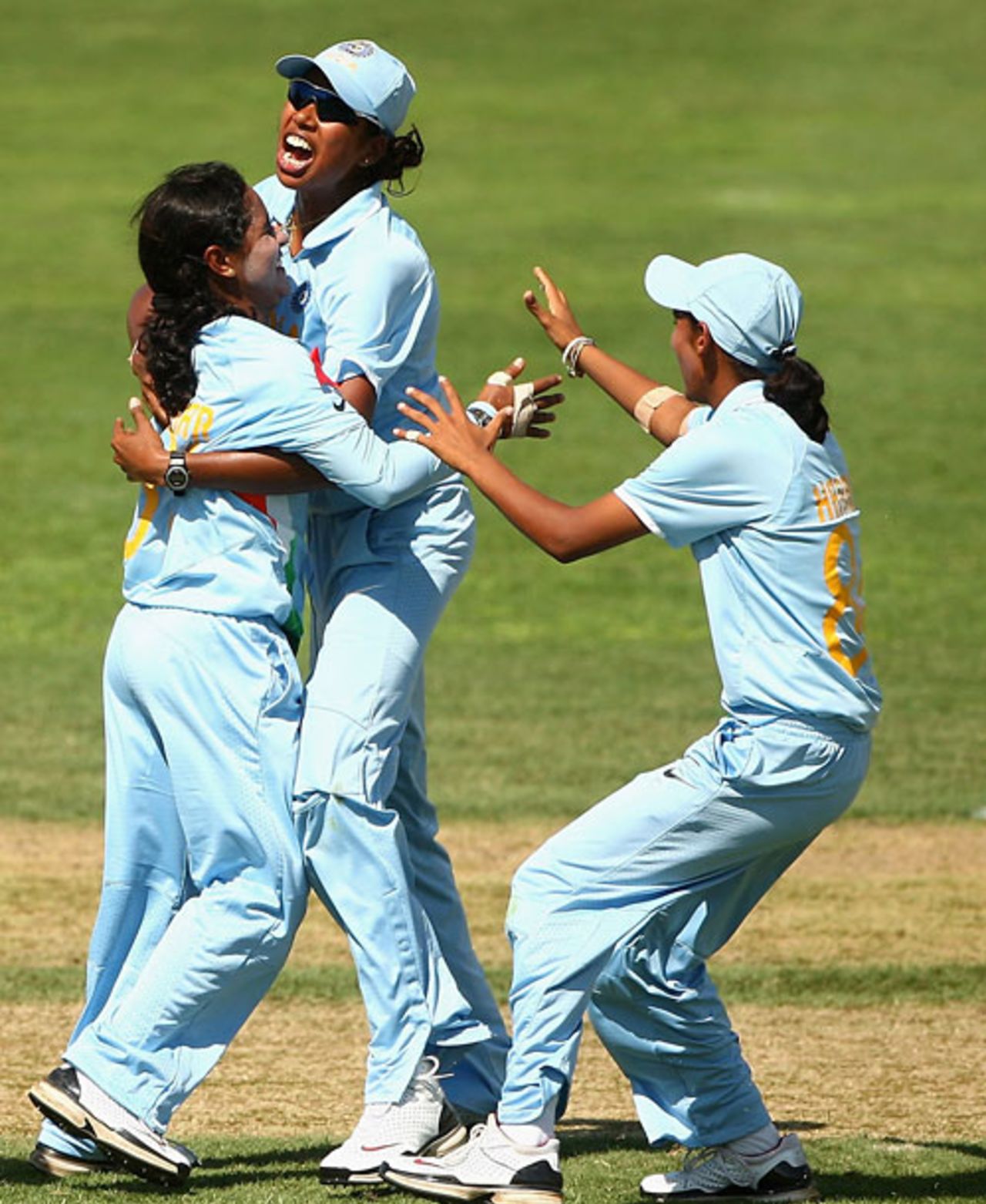 Gouher Sultan and Jhulan Goswami celebrate the fall of Karen Rolton, Australia v India, Super Six, women's World Cup, Sydney, March 14, 2009