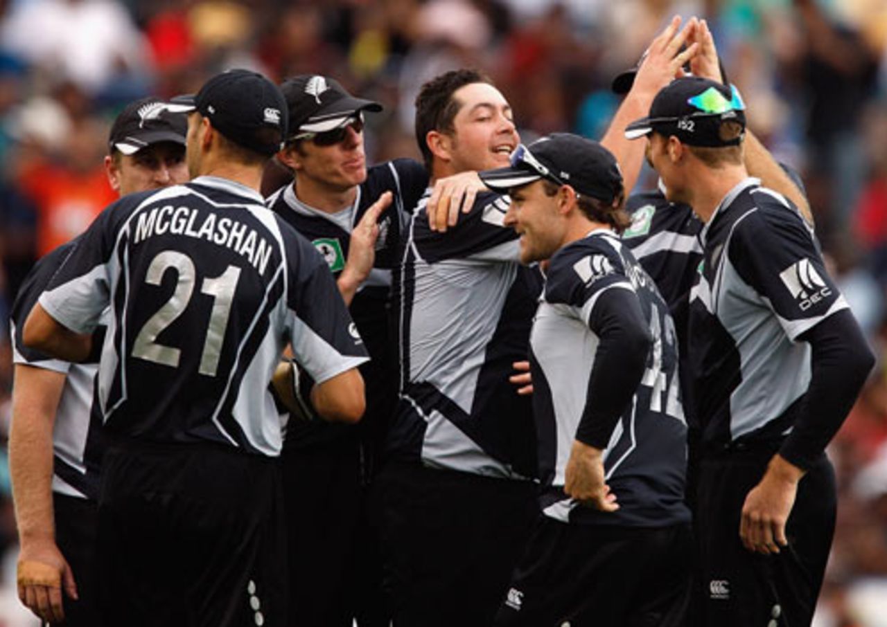 Jesse Ryder is mobbed by his team-mates after taking a wicket, New Zealand v India, 5th ODI, Auckland, March 14, 2009