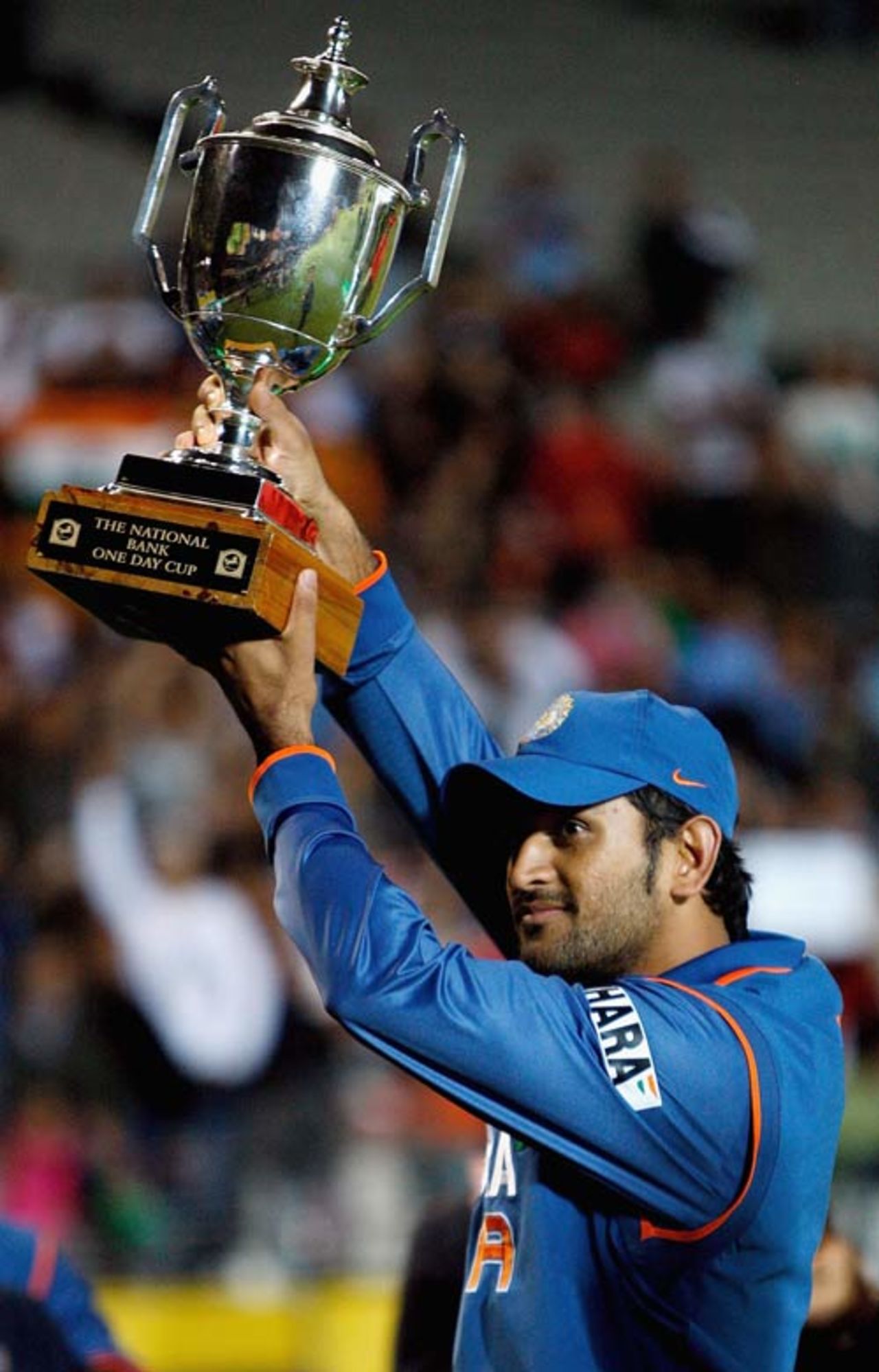 Mahendra Singh Dhoni holds aloft the trophy, New Zealand v India, 5th ODI, Auckland, March 14, 2009
