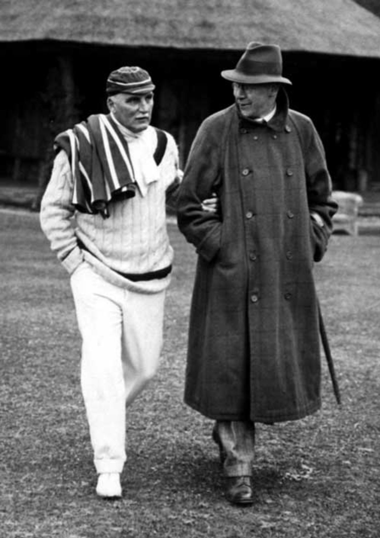 Archie MacLaren walks out to the pitch with a friend. Lionel Robinson's XI v Australia, Attleborough, 4 May 1921