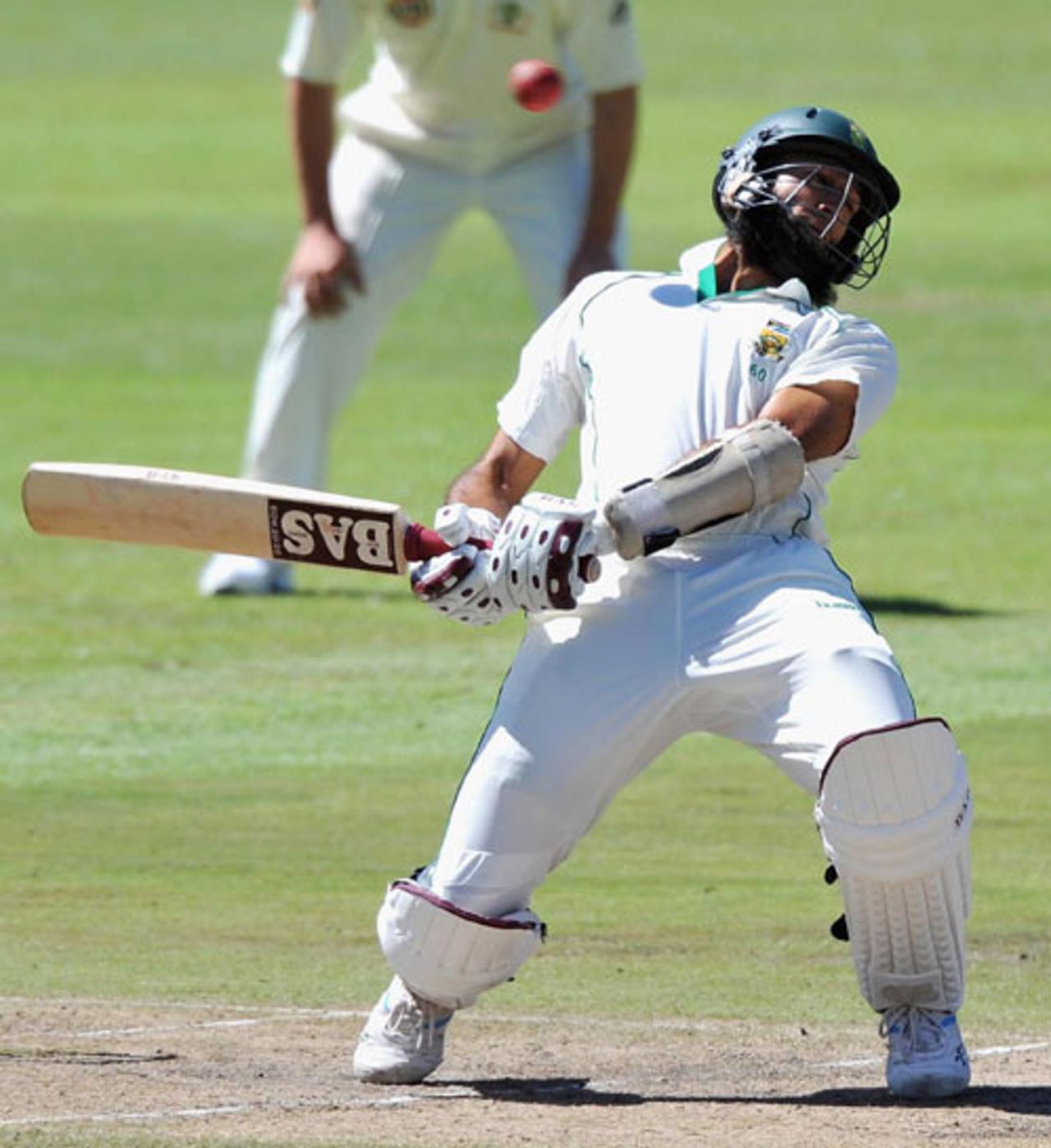 Hashim Amla swerves out of the way of a Mitchell Johnson bouncer, South Africa v Australia, 3rd Test, 2nd day, Cape Town, March 20, 2009