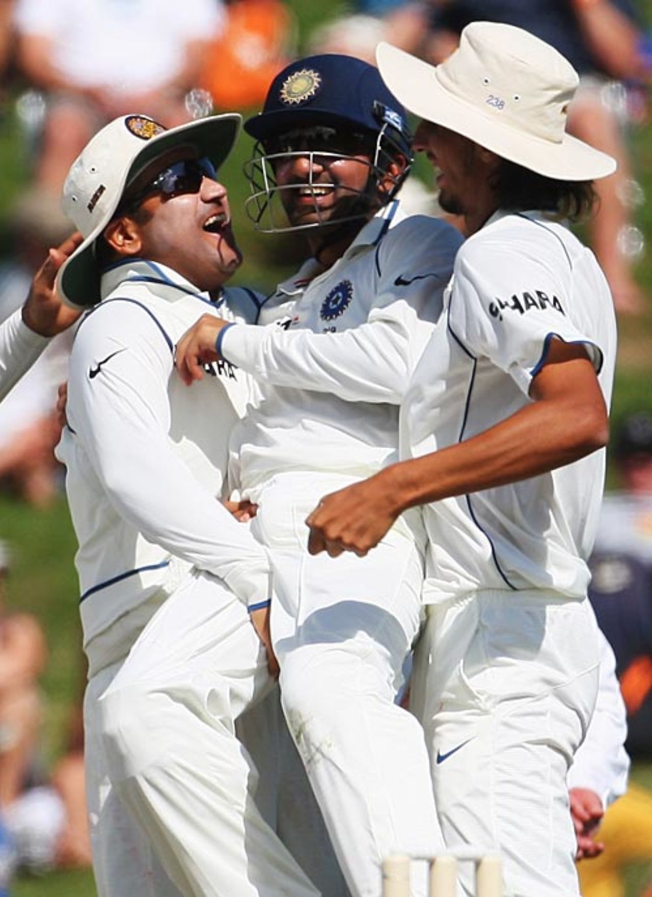 Gautam Gambhir is congratulated by Virender Sehwag and Ishant Sharma on taking the catch to dismiss Daniel Flynn , 1st Test, Hamilton, 4th day, March 21, 2009