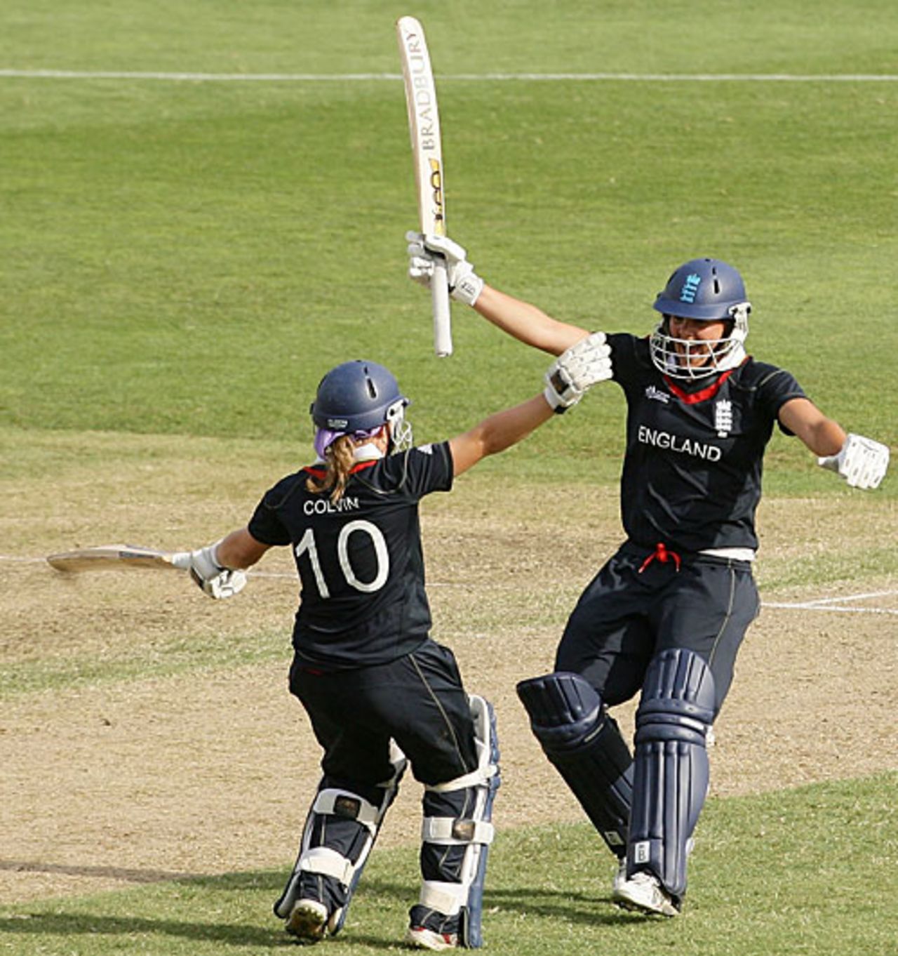 Holly Colvin celebrates with Nicky Shaw after hitting the winning runs, England v New Zealand, women's World Cup final, Sydney, March 22, 2009