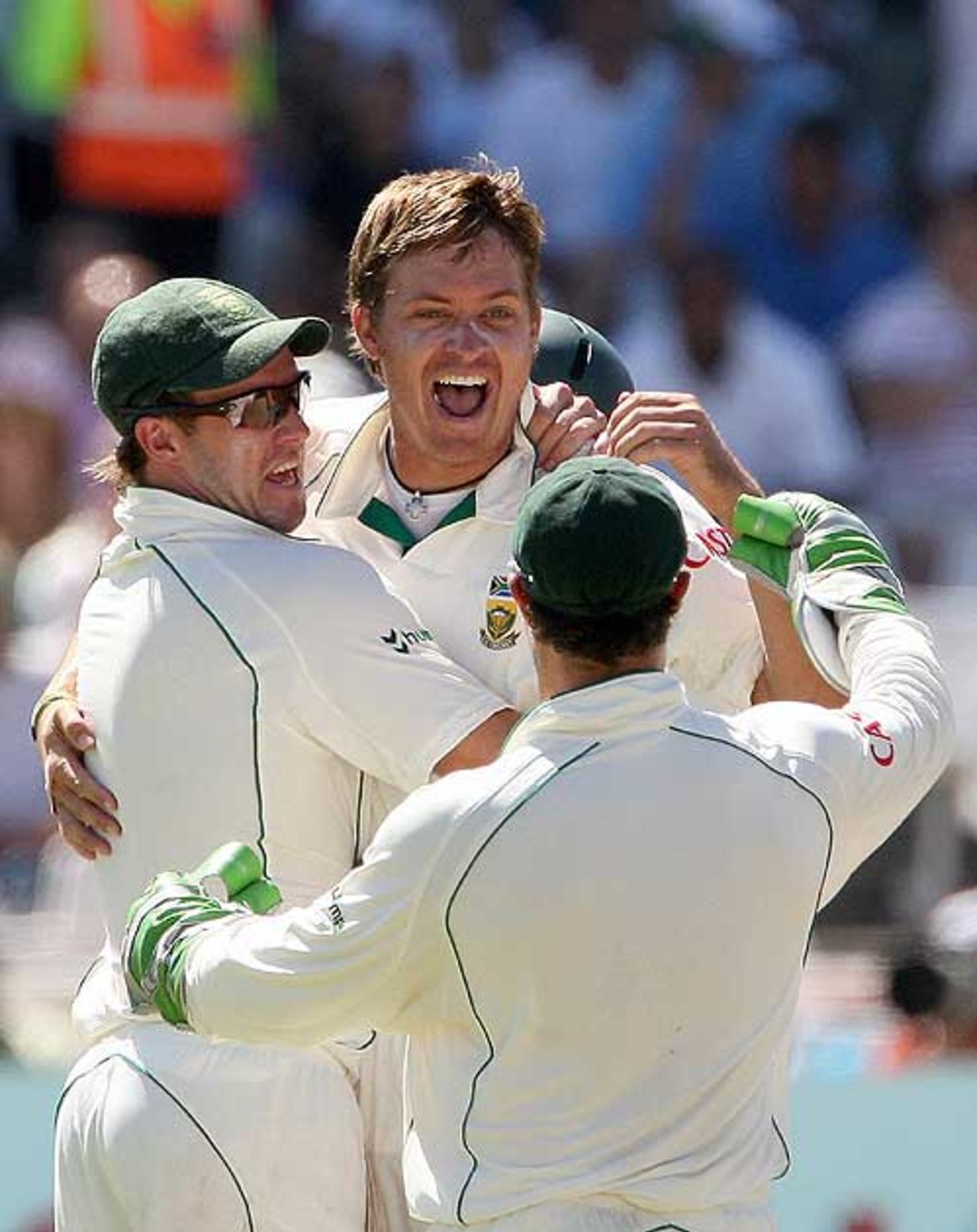 An animated Paul Harris is mobbed as Australia slip further, South Africa v Australia, 3rd Test, 4th day, Cape Town, March 22, 2009