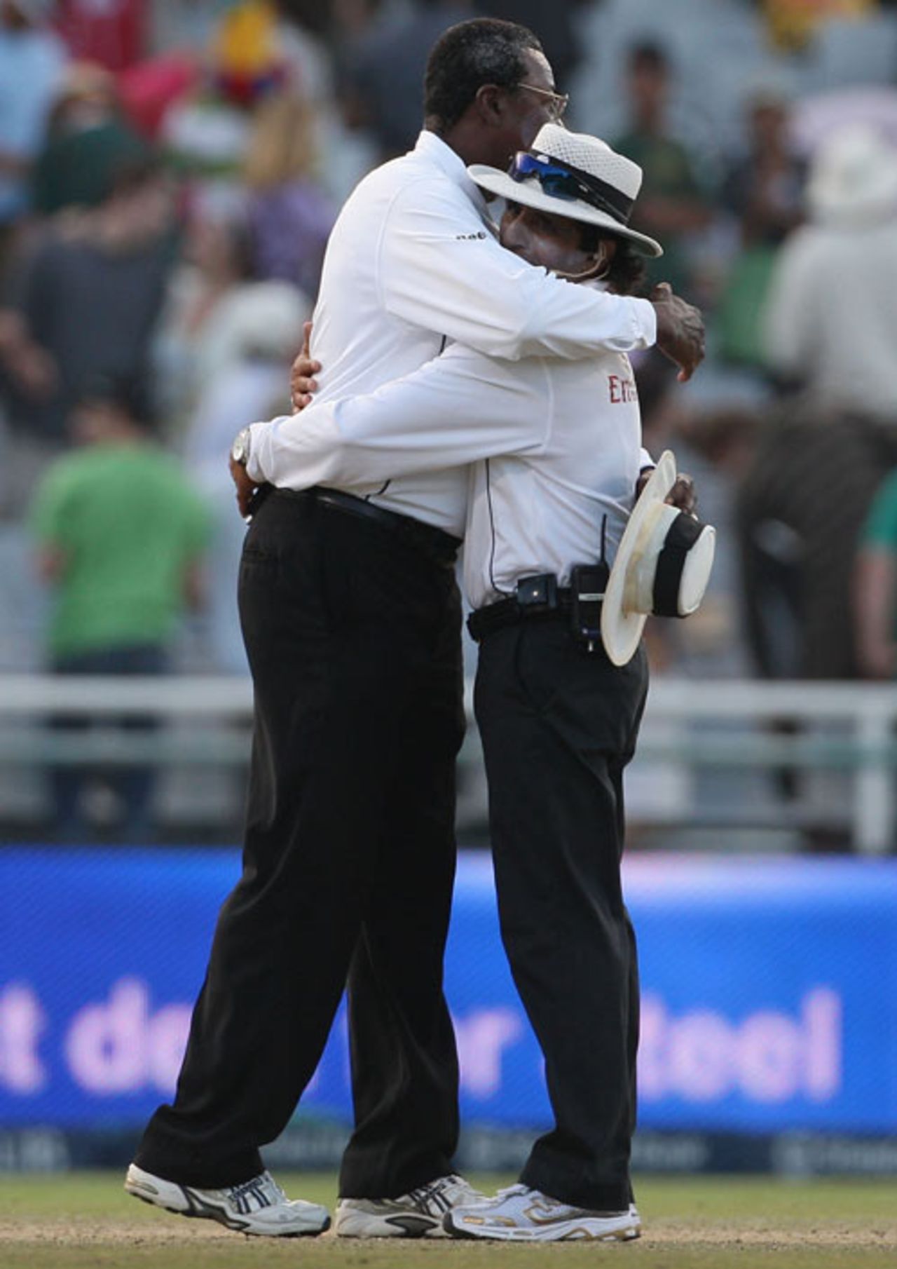 Steve Bucknor embraces Asad Rauf at the end of his final Test, South Africa v Australia, 3rd Test, 4th day, Cape Town, March 22, 2009