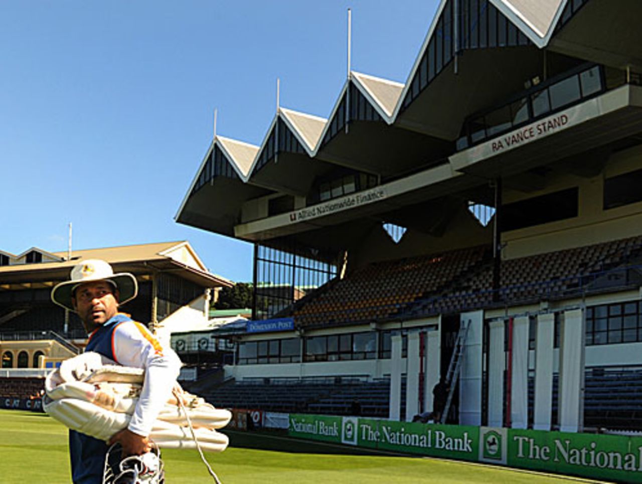 Sachin Tendulkar walks out for practice at the sunny Basin Reserve, Wellington, April 2, 2009