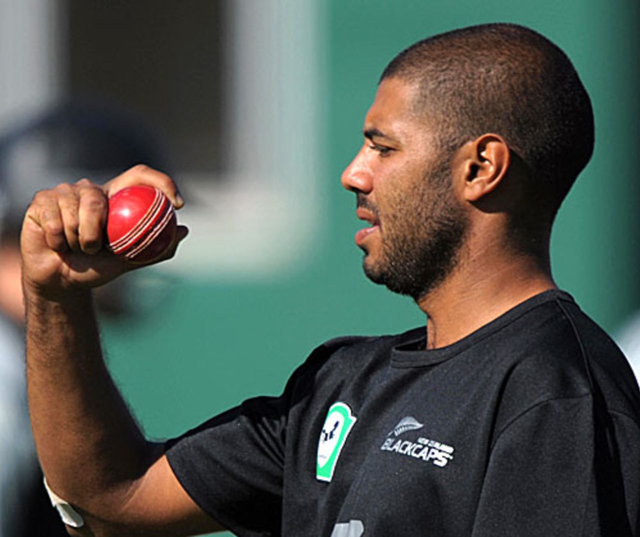 Jeetan Patel checks out his grip, Wellington, April 2, 2009