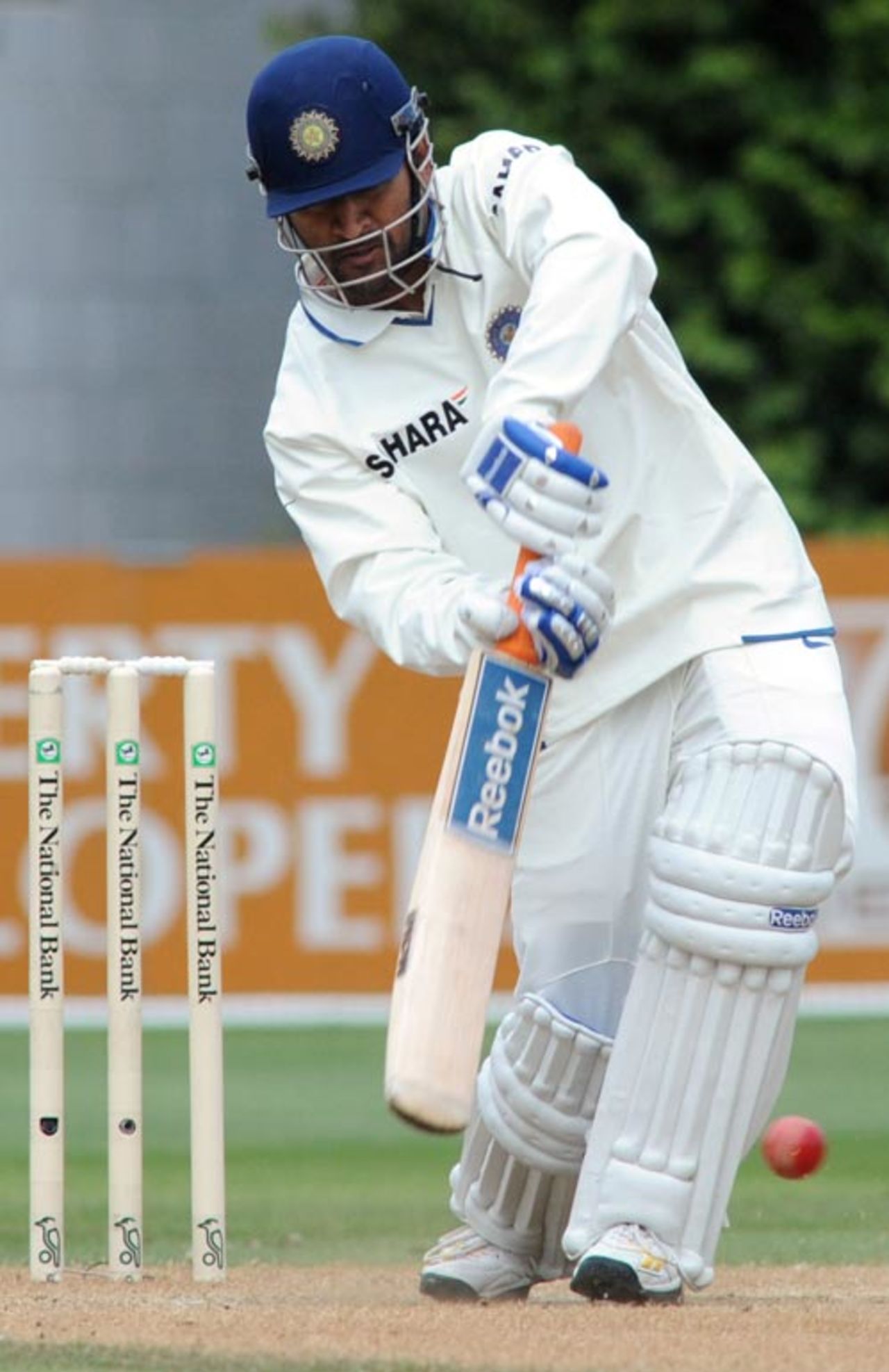 MS Dhoni forces the ball down the ground, New Zealand v India, 3rd Test, Wellington, 4th day, April 6, 2009