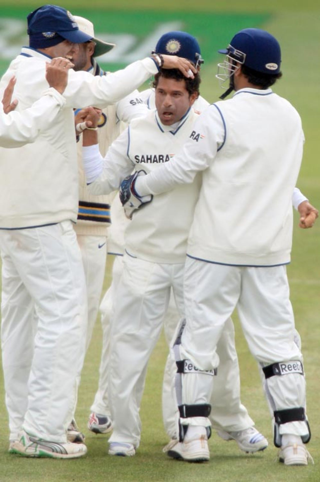 Sachin Tendulkar is congratulated by his team-mates on removing James Franklin, New Zealand v India, 3rd Test, Wellington, 5th day, April 7, 2009