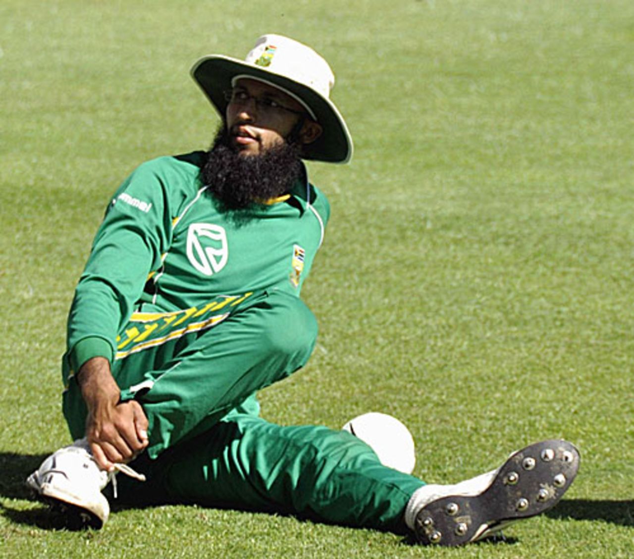 Hashim Amla stretches during training, Cape Town, April 7, 2009