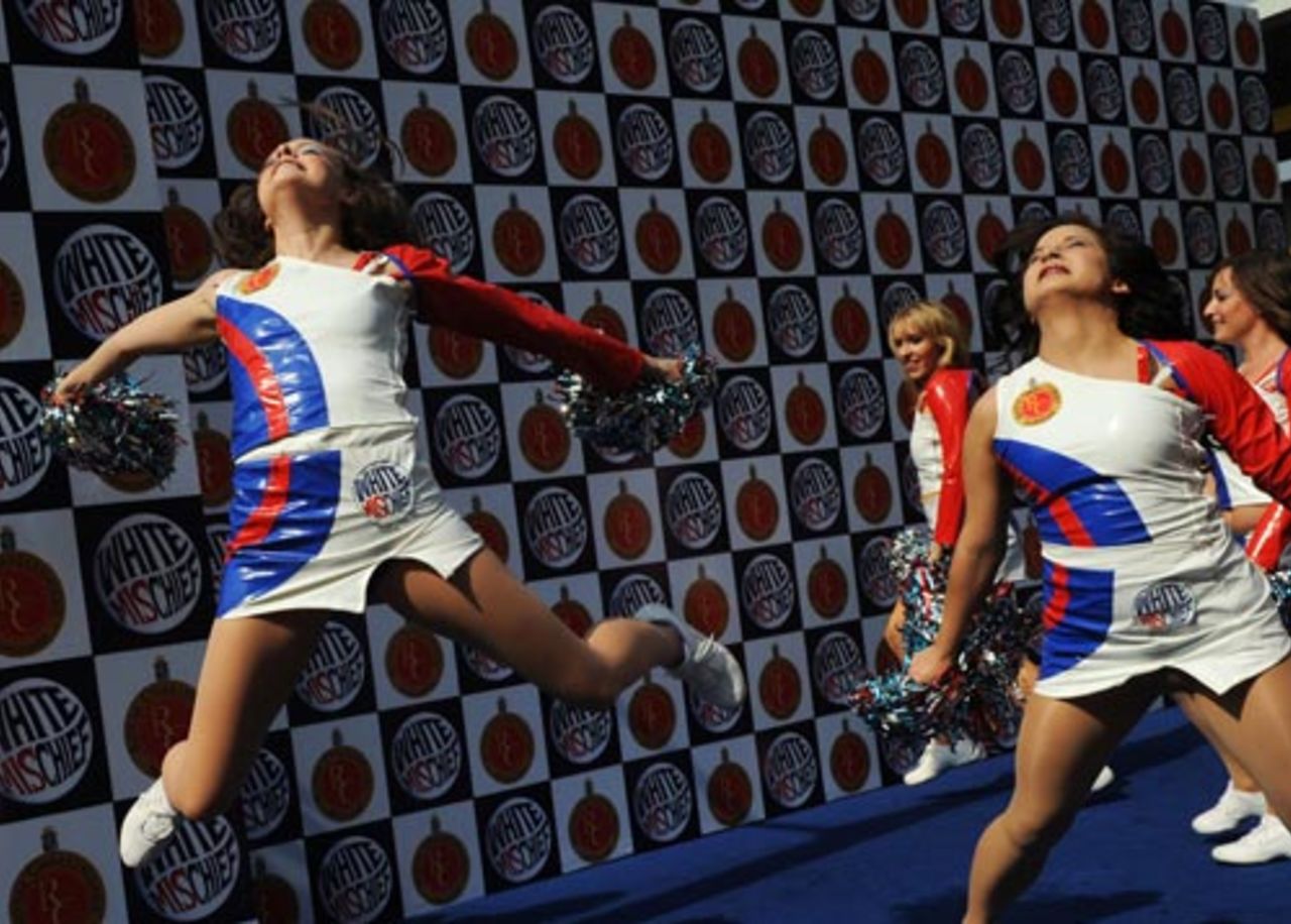 Cheerleaders of the Bangalore Royal Challengers perform during a preview at the Chinnaswamy Stadium, Bangalore, April 13, 2009