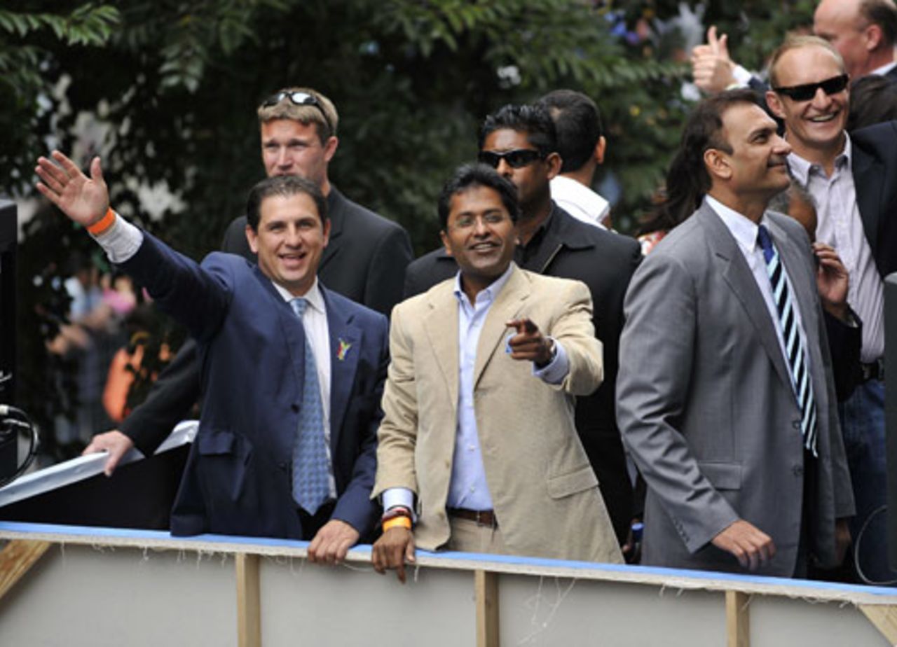 Lalit Modi and Ravi Shastri wave to members of the public during a parade through the streets of Cape Town, Indian Premier League, April 16, 2009