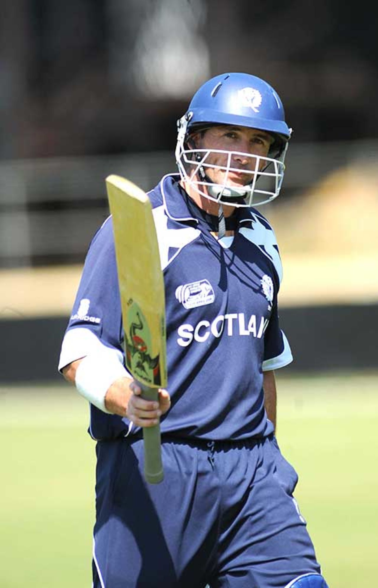 Gavin Hamilton raises his bat on crossing his century, Scotland v UAE, ICC World Cup Qualifiers, Super Eights, Benoni, April 17, 2009