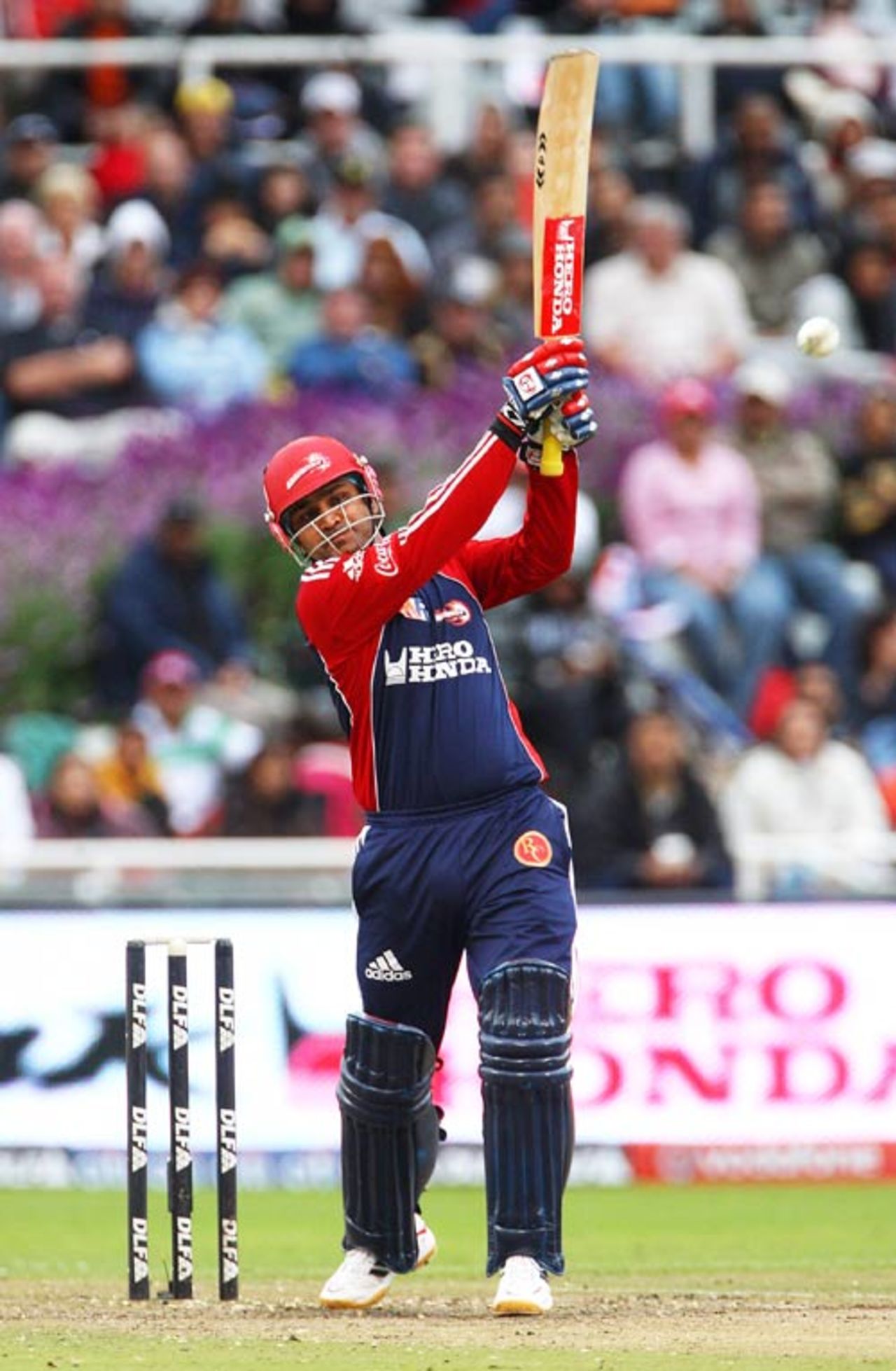 Virender Sehwag launches the ball over the bowler's head, Delhi Daredevils v Kings XI Punjab, IPL, 3rd game, Cape Town, April 19, 2009
