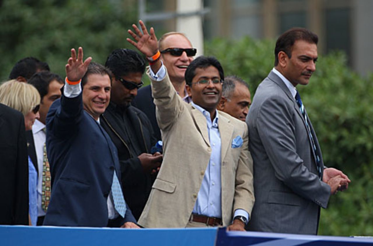 Lalit Modi and Ravi Shastri wave to members of the public during a parade through the streets of Cape Town, Indian Premier League, April 16, 2009