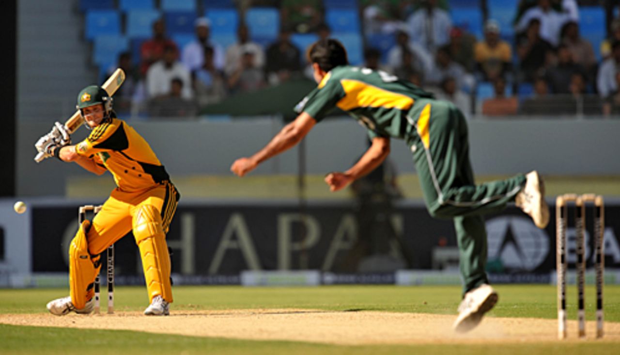 Shane Watson gears up to smash Iftikhar Anjum through the off side, not in frame, is run out by  Nasir Jamshed, Pakistan v Australia, 1st ODI, Dubai, April 22, 2009