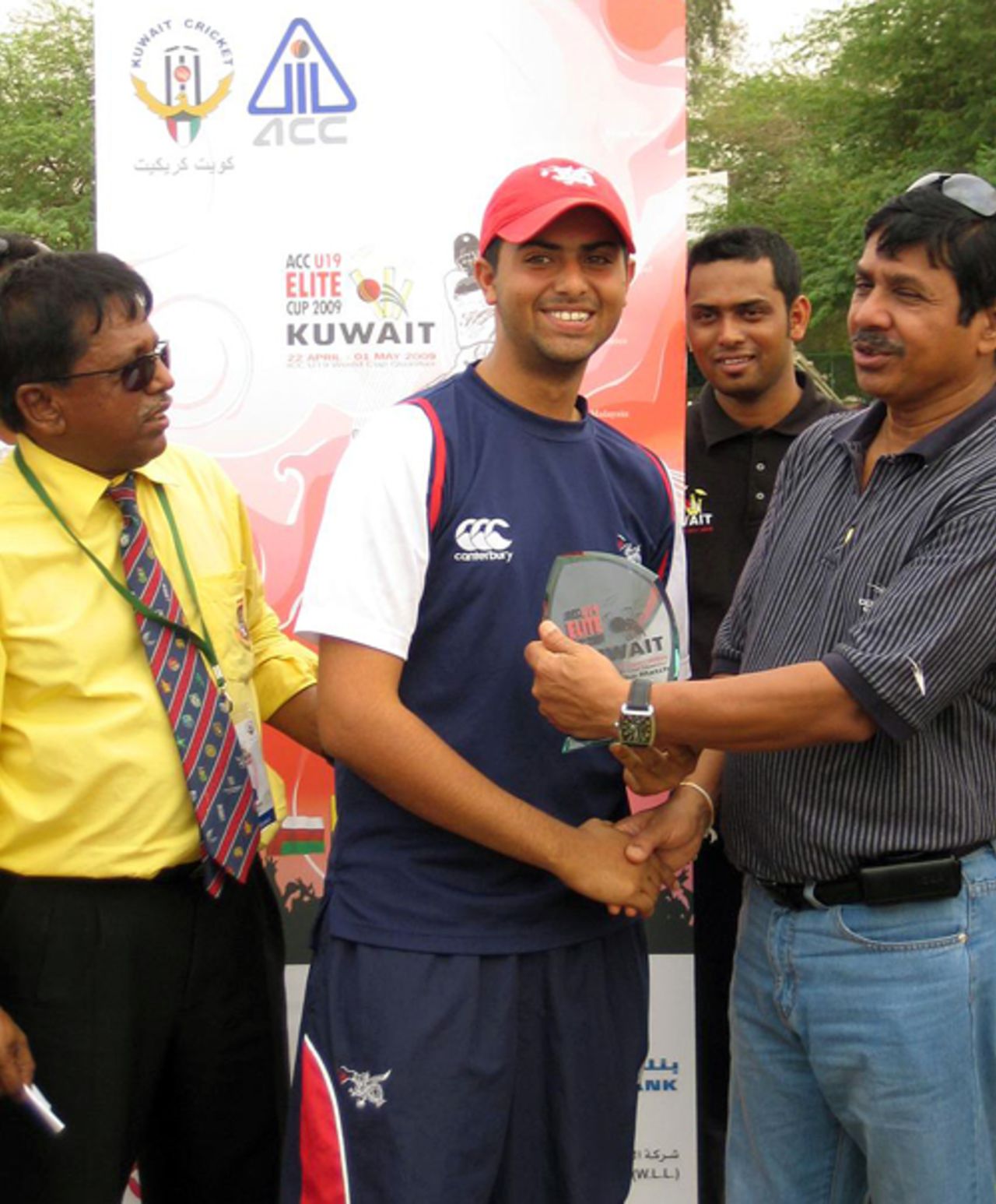 Niaz Ali receives his Player of the Match award from Mr. Bandula Wannapura after the ACC Under-19 Elite Cup semi-final victory over Qatar