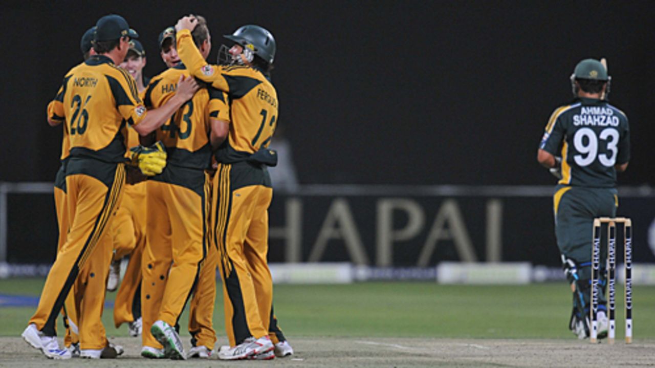 Nathan Hauritz is mobbed by team-mates after removing Ahmed Shehzad, Pakistan v Australia, 5th ODI, Abu Dhabi, May 3, 2009