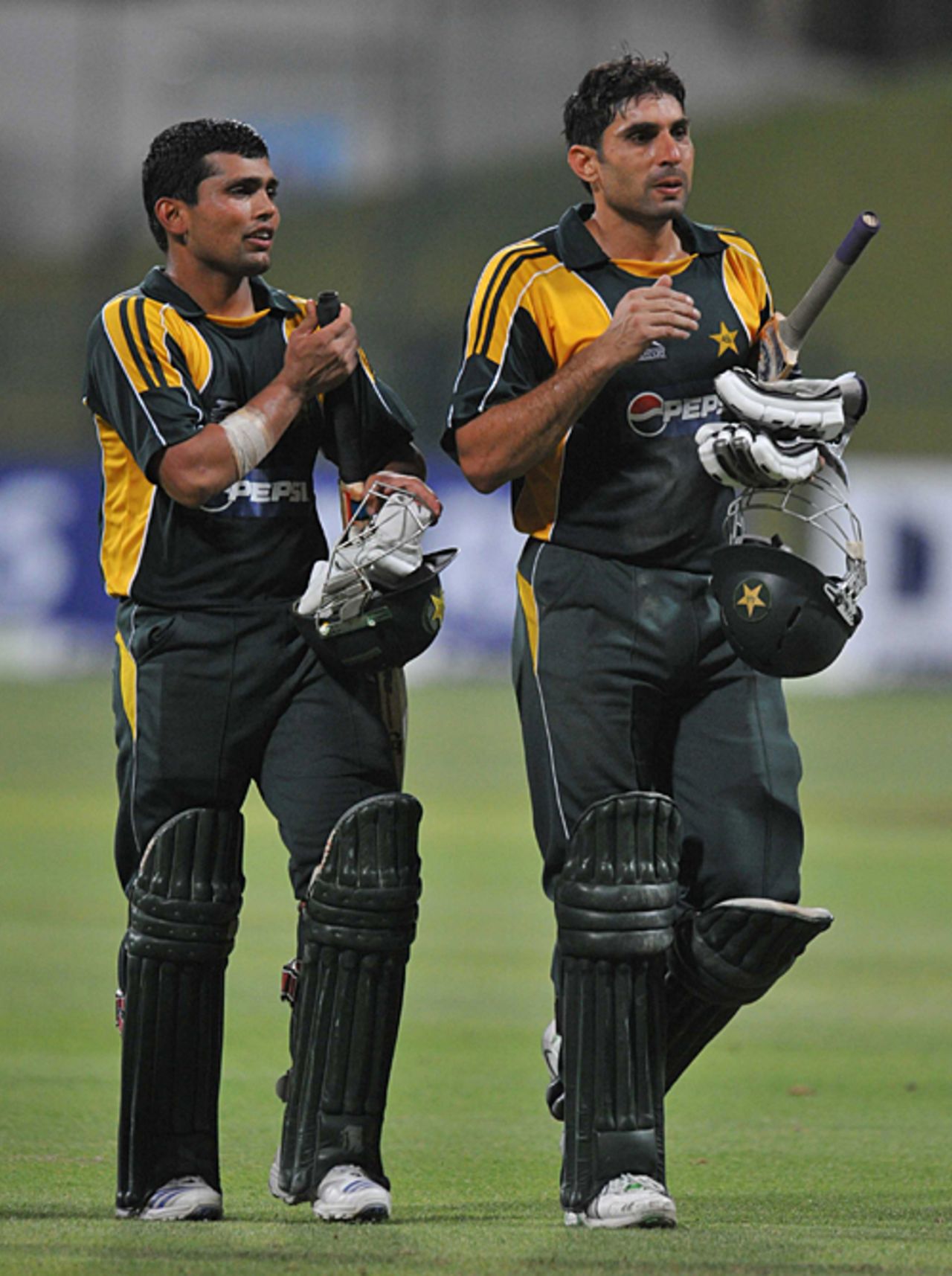 Kamran Akmal and Misbah-ul-Haq walk off victorious, Pakistan v Australia, 5th ODI, Abu Dhabi, May 3, 2009