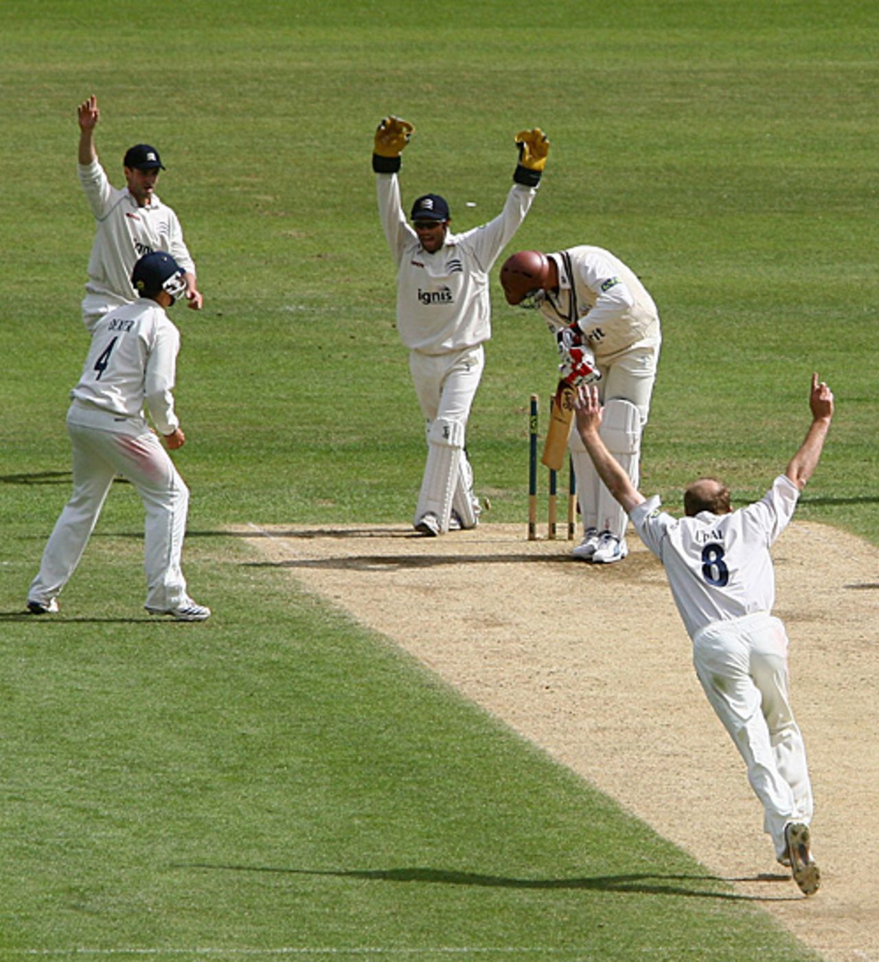 Shaun Udal bowls Andre Nel to grab his fifth wicket. He ended with 6 for 74, Surrey v Middlesex, The Oval, May 9, 2009