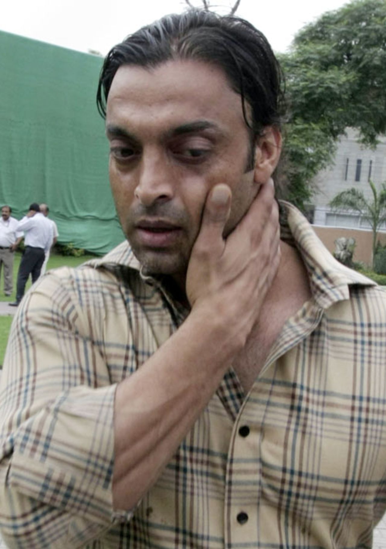 Shoaib Akhtar exits the Pakistan National Cricket Academy, Lahore, May 21, 2009