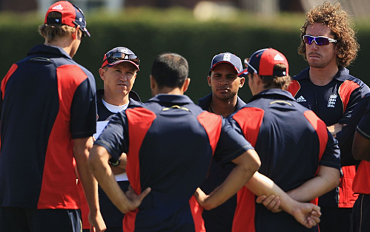 England players crowd around Andy Flower during a team talk, Loughborough, May 31, 2009