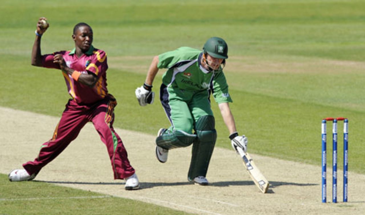 Fidel Edwards attempts a run-out as Andrew White tries to make his crease, Ireland v West Indies, ICC World Twenty20 warm-up match, The Oval, June 2, 2009