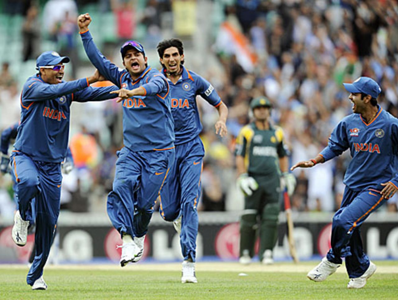 Suresh Raina and the rest celebrate the run-out of Kamran Akmal, India v Pakistan, ICC World Twenty20 warm-up match, The Oval, June 3, 2009