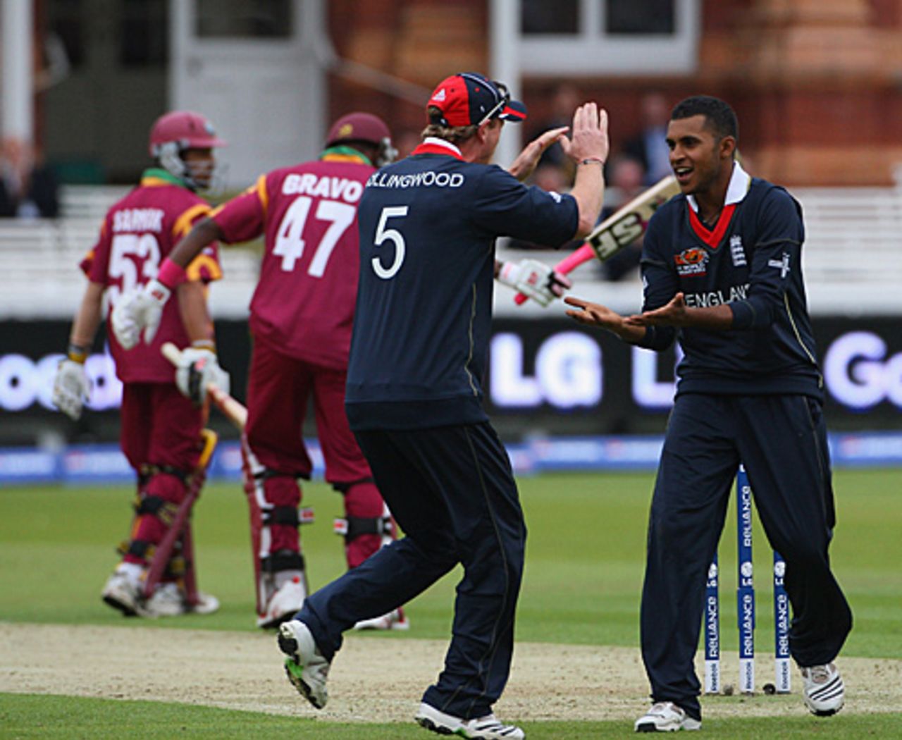 Paul Collingwood gives Adil Rashid five after the young legspinner finished with figures of 1 for 20 from his four overs, England v West Indies, ICC World Twenty20 warm-up, Lord's, June 3, 2009