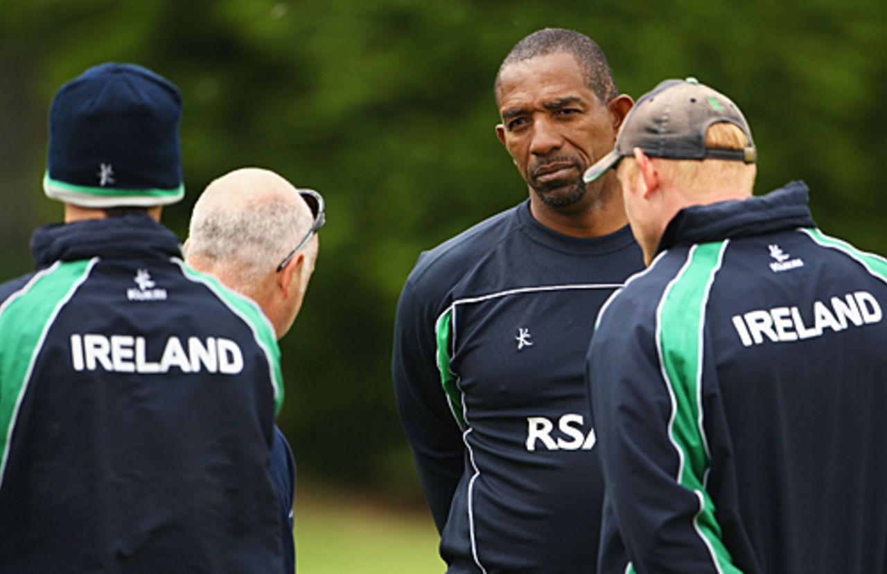 Phil Simmons has a word with the Ireland players at the nets, Nottingham, June 9, 2009