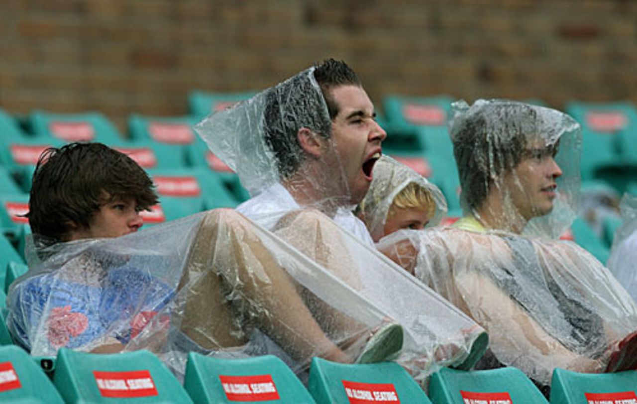 A fan yawns while sitting through a rain break, Australia v New Zealand, Chappell-Hadlee Trophy, Sydney, December 16, 2007
