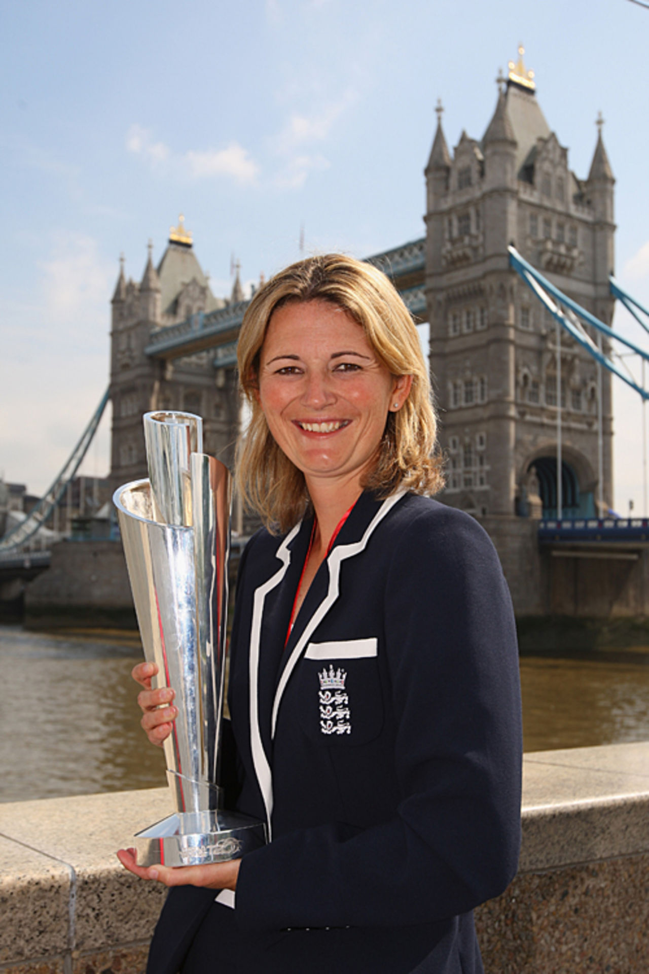 Charlotte Edwards poses with the ICC World Twenty20 trophy in front of Tower Bridge, London, June 22, 2009