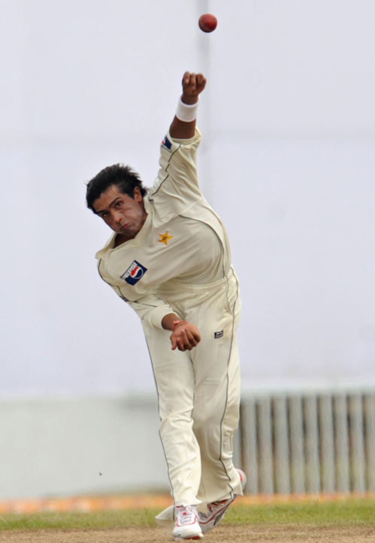 Pakistan fast bowler Mohammad Aamer in his delivery stride, Pakistan v Sri Lanka, 1st Test, Galle, 1st day, July 4, 2009 