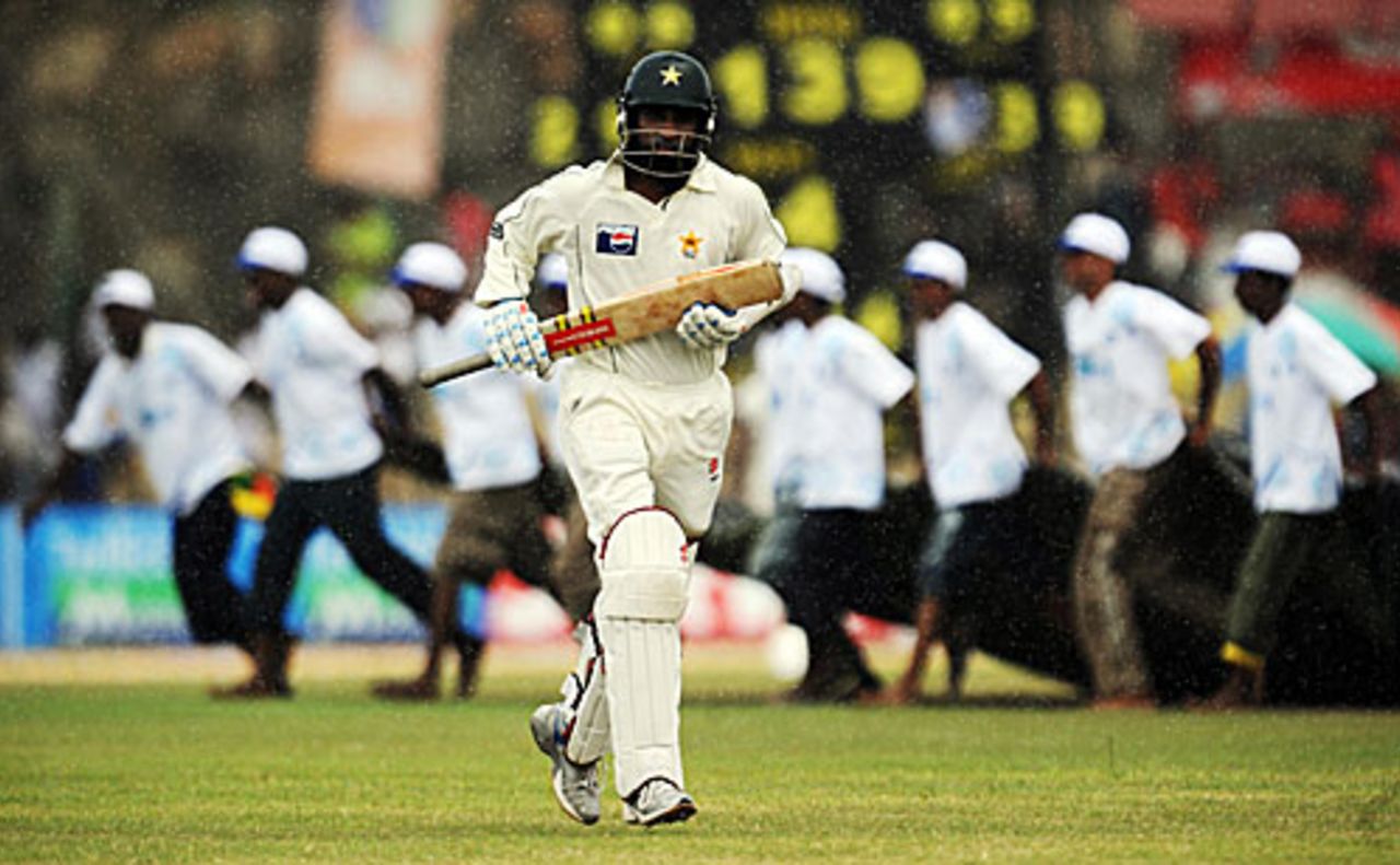 Mohammad Yousuf jogs off the field after a rain interruption, Pakistan v Sri Lanka, 1st Test, Galle, 2nd day, July 5, 2009 